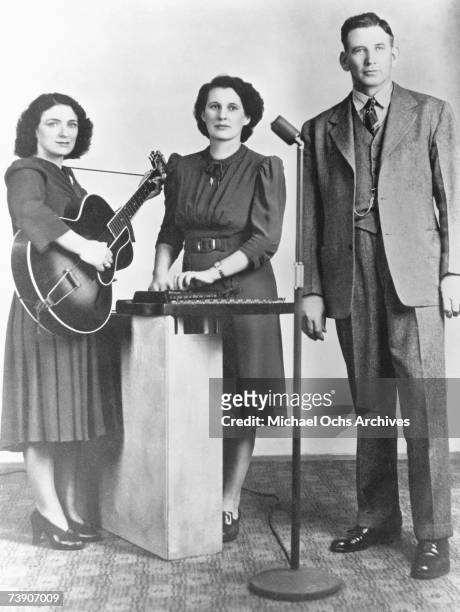 Bluegrass musicians "The Carter Family" pose for a portrait in circa 1931 in Louisville, Kentucky. Maybelle Carter, Sara Carter, Alvin P. Carter.