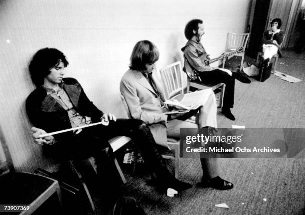 Jim Morrison, John Densmore, Robbie Krieger, Ray Manzarek pose for a portrait on September 14, 1968 in Frankfurt Germany,