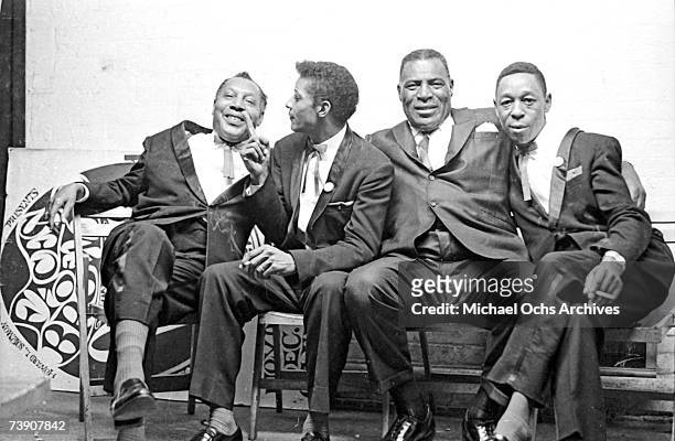 Photo of Howlin' Wolf pictured with his band including guitarist Hubert Sumlin 2nd from left on 29th September 1971.