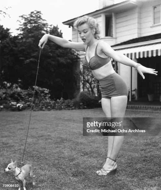 Actress Marilyn Monroe photo session at Hollywood agent Johnny Hyde's backyard on May 17, 1950 in Beverly Hills, California.