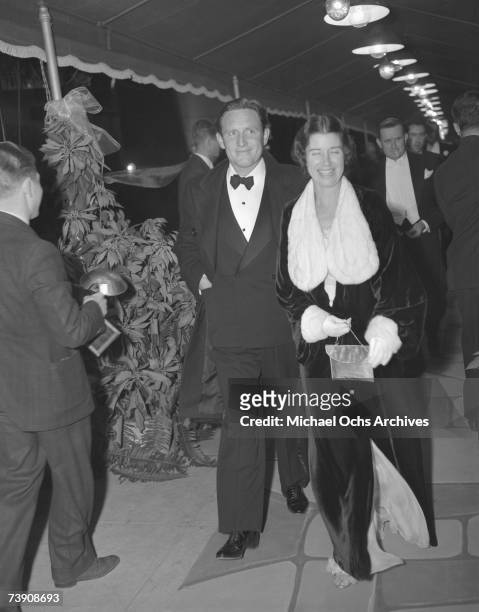 Actor Spencer Tracy And wife Louise Treadwell attend a premiere on November 25, 1936 in Los Angeles, California.