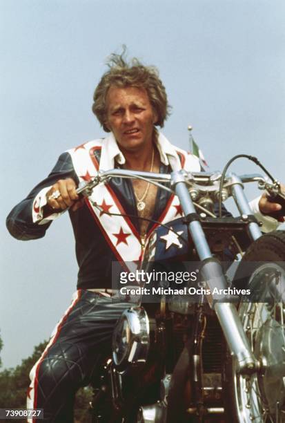 DaredEvel Evel Knievel poses on his motorcycle circa 1973.