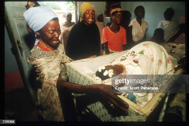 Louisa mourns the death of her daughter Tereza Francisco Manuel who died attempting childbirth February 12, 1994 in Malange, Angola. In war-torn...