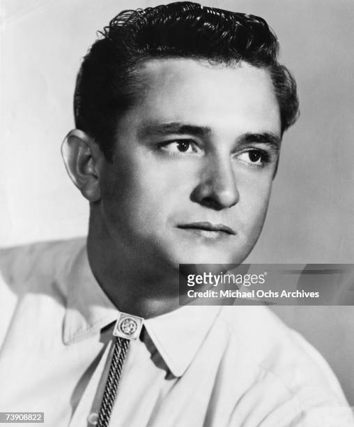 Country singer/songwriter Johnny Cash poses for a portrait in 1955 in Memphis, Tennessee.
