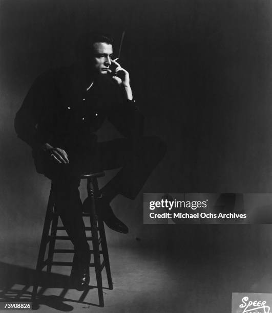 Country singer/songwriter Johnny Cash poses for a portrait in 1957 in Memphis, Tennessee.