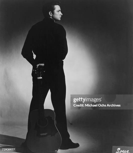 Country singer/songwriter Johnny Cash poses for a portrait in 1957 Memphis, Tennessee.