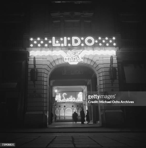 Exterior of the Lido nightclub on a foggy street at night on November 1 1948 in Paris, France.