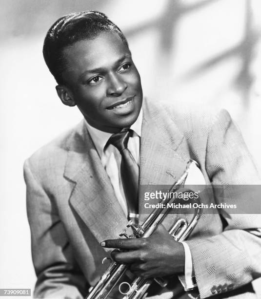 Jazz trumpeter Miles Davis poses for a portrait early in his career holding his horn in 1948 in New York City, New York.