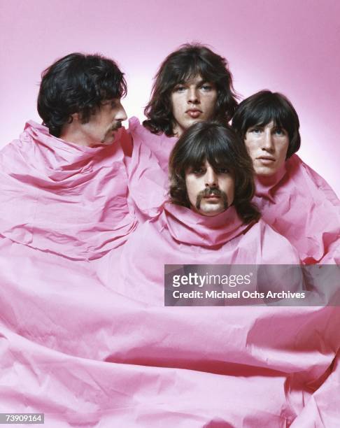 Psychedelic rock group Pink Floyd pose for a portrait shrouded in pink in August of 1968 in Los Angeles. Nick Mason, Dave Gilmour, Rick Wright ,...