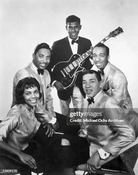 Smokey Robinson and The Miracles pose for a portrait circa 1962 in Detroit, Michigan.