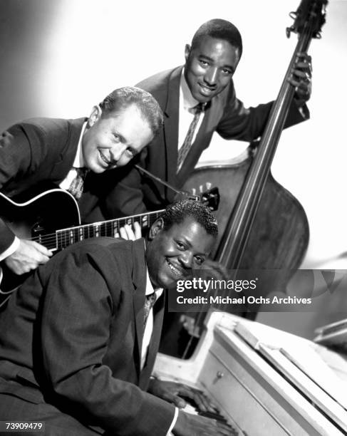 Photo of Oscar Peterson. Oscar Peterson Trio, NYC NY. Oscar Peterson , Herb Ellis , Ray Brown . Mid 1950s..