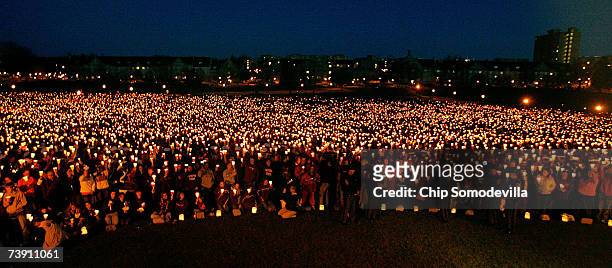 Thousands of people attend a candlelight vigil on the campus of Virginia Tech April 17, 2007 in Blacksburg, Virginia. According to police, English...