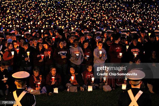 Thousands of people attend a candlelight vigil on the campus of Virginia Tech April 17, 2007 in Blacksburg, Virginia. According to police, English...