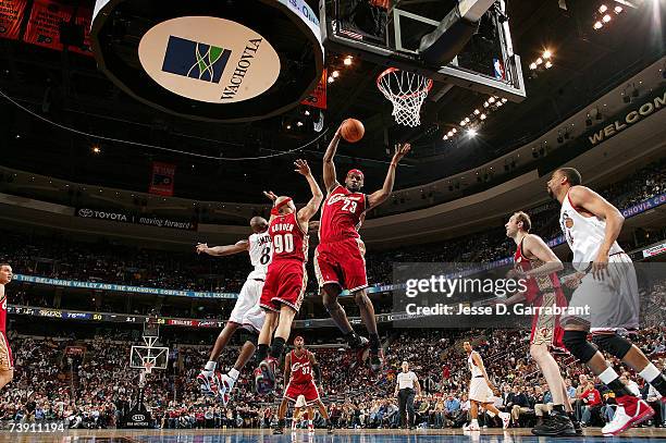 LeBron James of the Cleveland Cavaliers rebounds against Joe Smith of the Philadelphia 76ers on April 17, 2007 at the Wachovia Center in...