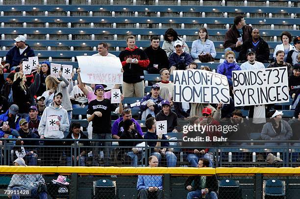 Fans in left field heckle Barry Bonds of the San Francisco Giants in a game against the Colorado Rockies on April 17, 2007 at Coors Field in Denver,...