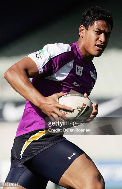 Israel Folau of the Storm looks to pass during a Melbourne Storm NRL training session at MC Labour Park April 18, 2007 in Melbourne, Australia.