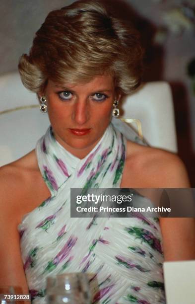 Princess Diana wearing a Catherine Walker gown at a banquet given by President Ibrahim Babangida in Lagos, Nigeria, March 1990.