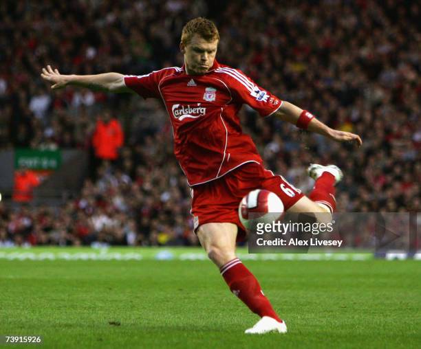 John Arne Riise of Liverpool shoots at goal during the Barclays Premiership match between Liverpool and Middlesbrough at Anfield on April 18, 2007 in...
