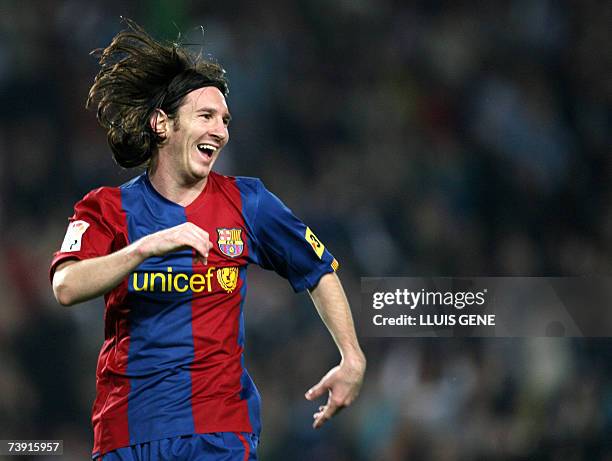 Barcelona's Argentinian Leo Messi celebrates after scoring the second goal against Getafe during their Spanish King's Cup football match, 18 April...