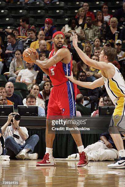 Rasheed Wallace of the Detroit Pistons looks for an open pass over Troy Murphy of the Indiana Pacers during the game at Conseco Fieldhouse on April...