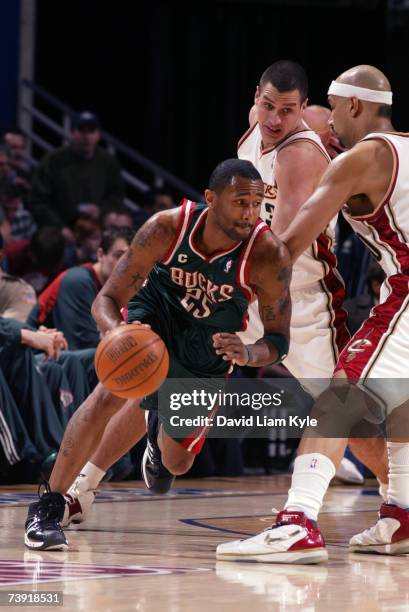 Maurice Williams of the Milwaukee Bucks drives around Drew Gooden of the Cleveland Cavaliers April 18, 2007 at The Quicken Loans Arena in Cleveland,...