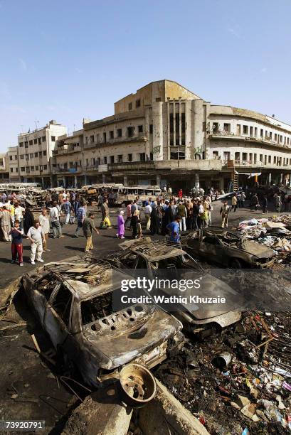 Iraqis gather at the site of the devastating Sadriya market bombing on April 19, 2007 in Baghdad, Iraq. At least 127 people were killed and 148...