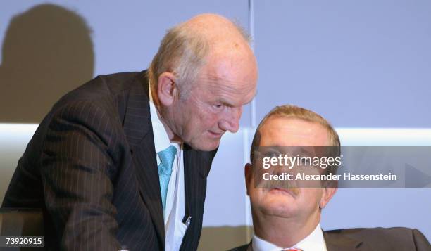 Porsche Chairman Wendelin Wiedeking talks with Volkswagen supervisory board chief Ferdinand Piech during the Volkswagen AG Annual General Meeting at...