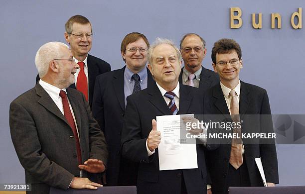 Members of Germany's leading economic research institutes Gebhard Flaig , Joachim Scheide , Roland Doehrn , Udo Ludwig , Alfred Steinherr and Axel...