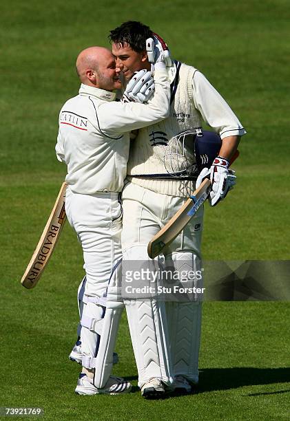 Middlesex batsman Billy Godleman is congratulated by team mate David Nash after scoring a hundred on his County Championship debut during the second...