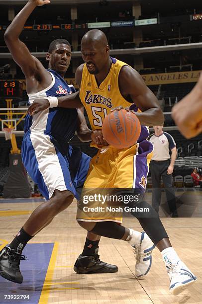 Babacar Camara of the Los Angeles D-Fenders moves the ball around Steven Smith of the Anaheim Arsenal during the D-League game on April 1, 2007 at...