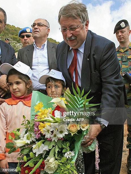 Belgium's Defence Minister Andre Flahaut lays a wreath at the place where three Belgian UN peacekeepers were killed last month in a road accident in...