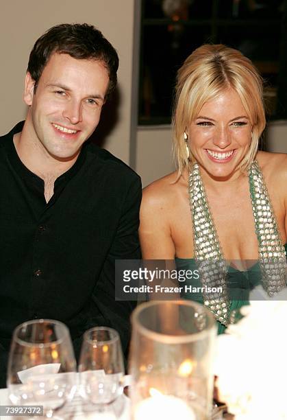 Actor Jonny Lee Miller and Sienna Miller attend an intimate dinner hosted by Chanel and Sienna Miller in honor of Les Exclusifs de Chanel held at...