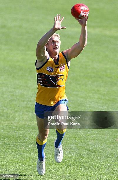 Michael Braun of the Eagles marks the ball during a West Coast Eagles AFL training session at Subiaco Oval on April 20, 2007 in Perth, Australia.