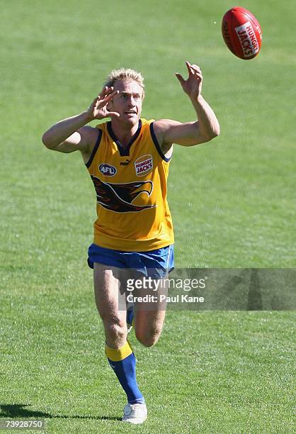 Michael Braun of the Eagles marks the ball during a West Coast Eagles AFL training session at Subiaco Oval on April 20, 2007 in Perth, Australia.