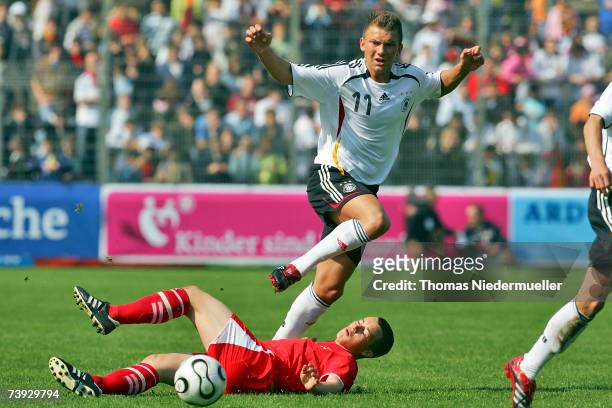 Tim Scheffler of Germany in action with Gabriel Luechinger of Switzerland during the men's U15 international friendly match between Germany and...