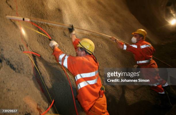 Miners prepare a stone wall for detonation at the construction site for the Gotthard Base Tunnel on April 19, 2007 near Sedrun, Switzerland. Deep...