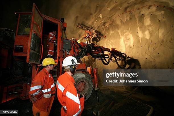 Giant drill prepares drillholes to be filled with explosives at the construction site for the Gotthard Base Tunnel on April 19, 2007 near Sedrun,...