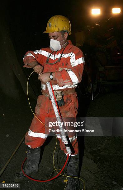 Miner handles explosives at the construction site for the Gotthard Base Tunnel on April 19, 2007 near Sedrun, Switzerland. Deep beneath the Alps, the...