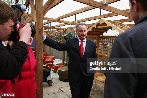 First Minister Jack McConnell of the Scottish Labour Party visits Blackburn Local Employment Scheme April 20, 2007 in Bathgate, Scotland. Mr...