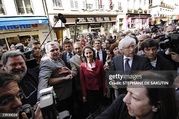 French Socialist Party presidential candidate Segolene Royal , flanked by Paris' mayor Bertrand Delanoe and Pierre Shapira , deputy mayor in charge...