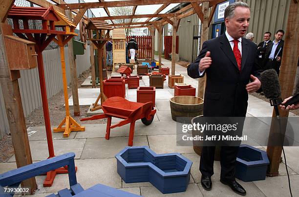 First Minister Jack McConnell of the Scottish Labour Party visits Blackburn Local Employment Scheme April 20, 2007 in Bathgate, Scotland. Mr...