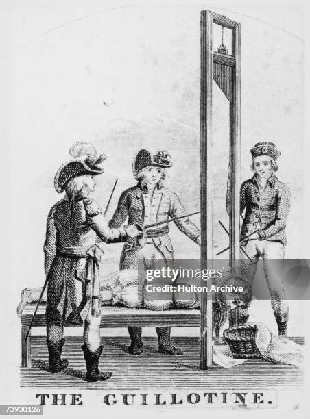 Victim undergoes execution by guillotine during the French Revolution, circa 1793.