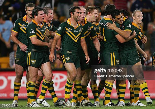 Karmichael Hunt of the Kangaroos celebrates scoring a try with team mates during the ARL Bundaberg Test match between the Australian Kanagroos and...