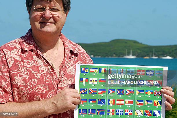 Noumea, FRANCE : Jean-Raymond Postic, membre du comite de pilotage sur les signes identitaires, pose avec un depliant ou figurent plus de 80 idees de...