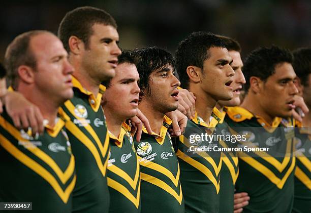 Johnathan Thurston of the Kanagroos and team mates sing the national anthem during the ARL Bundaberg Test match between the Australian Kanagroos and...