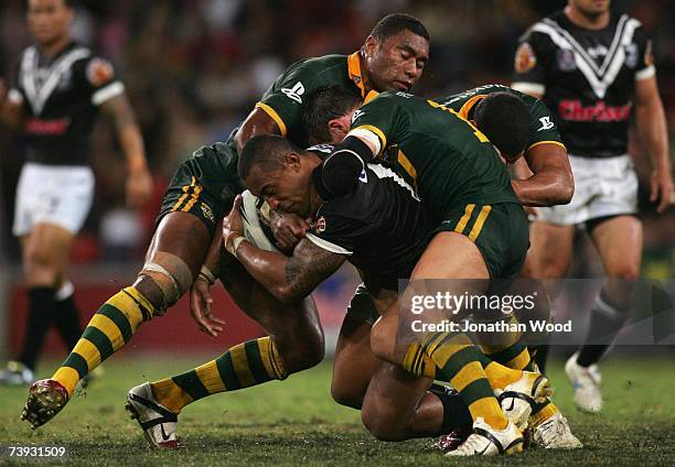 Roy Asotasi of the Kiwis is tackled during the ARL Bundaberg Test match between the Australian Kangaroos and the New Zealand Kiwis at Suncorp Stadium...