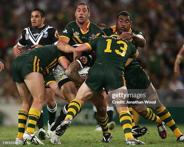 Sonny Bill Williams of the Kiwis is mobbed by the Kangaroos defense during the ARL Bundaberg Test match between the Australian Kangaroos and the New...