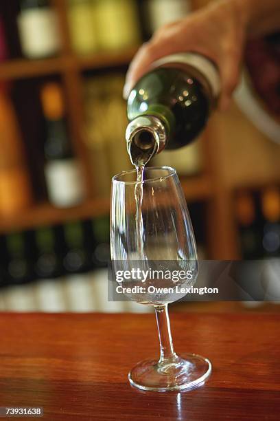 wine being poured at vasse felix vineyard in margaret river, australia - margaret river (wine) stock pictures, royalty-free photos & images