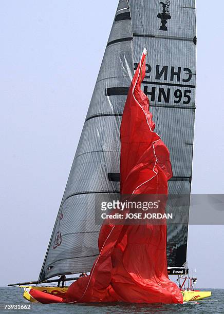 China Team lowers the spinaker on the fifth day of racing in the challenger selection series of the Louis Vuitton Cup in Valencia, 20 April 2007....