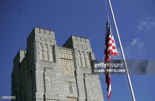 Blacksburg, UNITED STATES: A US flag flies at half staff outside Burruss Hall 20 April, 2007 on the campus of Virginia Tech in Blacksburg, Virginia....